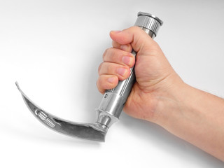 Laryngoscope with curved blade