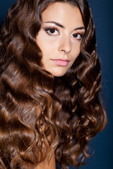 Fototapeta premium Beautiful lady with Long Healthy Wavy Hair
