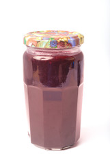 Jar of jam on a white background