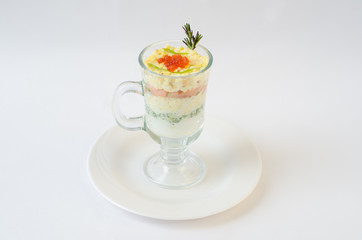 salad with fish in the glass