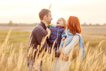 Young Attractive Parents and Child Portrait