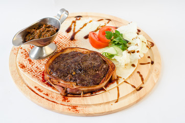 Minced meat with sauce on plate.