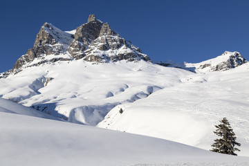 Fototapeta na wymiar Austrian Alps, mountain range covered in the snow, winter
