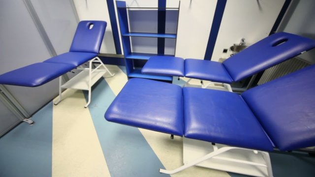 Relaxation and massage room with stove benches for sportspeople