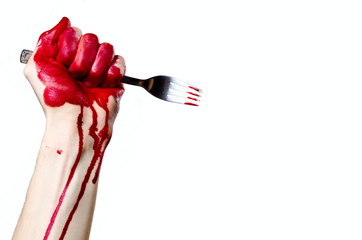 Bloody hand holding a fork isolated on white