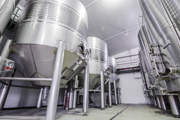 modern wine cellar with stainless steel tanks