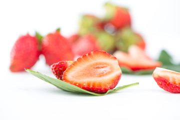 Fresh strawberry on green leaf show food concept