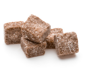 Brown lump cane sugar cube isolated on white background cutout