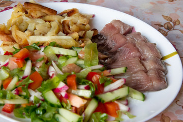 herring fillet with potatoes and vegetables