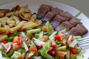 herring fillet with potatoes and vegetables