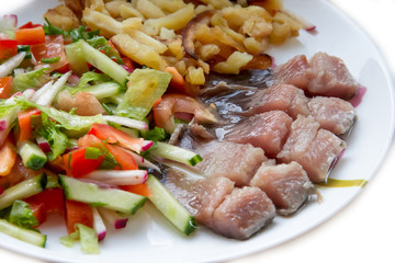 herring fillet with potatoes and vegetables