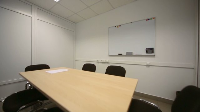 Small meeting room in office of shop selling at dealership