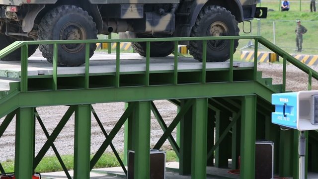 Wheels of KAMAZ-43501, which overcomes the obstacle stairs