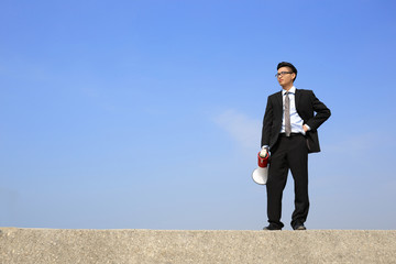 business man using megaphone