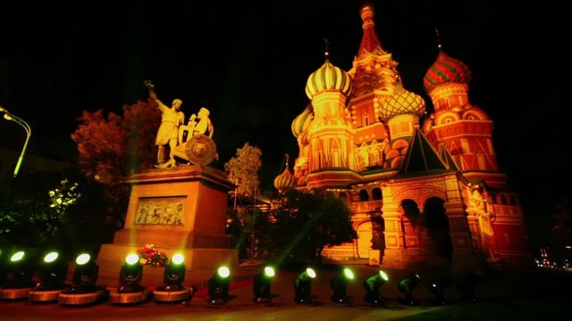 Several projectors near monument of Minin and Pozharsky at night