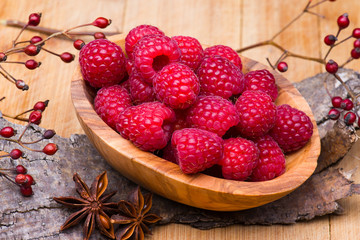 Raspberry in wood bowl