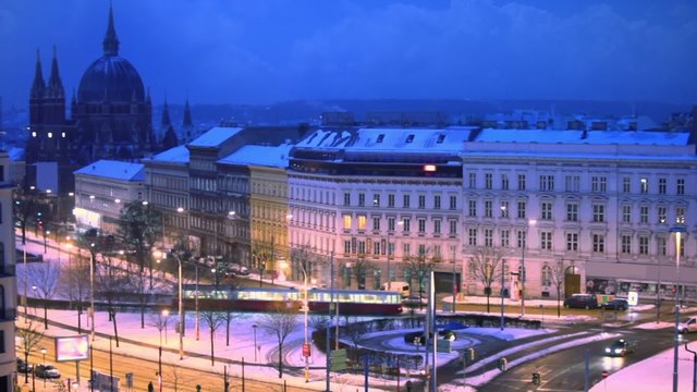 Traffic on Europe square in Vienna at winter night