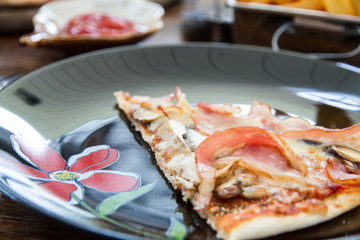 One piece of bacon pizza