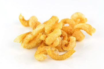 pork rind cracklings on white background