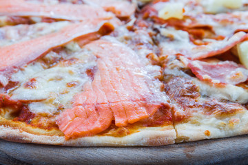 Pizza Hawaiian and Salmon pizza