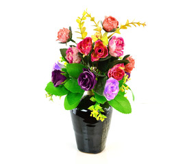Colorful flower bouquet in vase isolated on white background