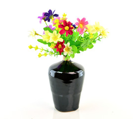 Colorful flower bouquet in vase isolated on white background
