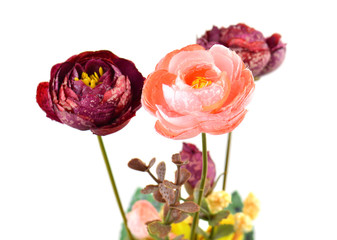 Obraz premium Artificial Flowers on white background