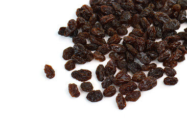 Dried raisins on a white background