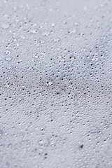 background texture dew droplets on a smooth surface