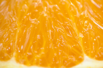 Fototapeta na wymiar Background of juicy fresh orange. Macro shot