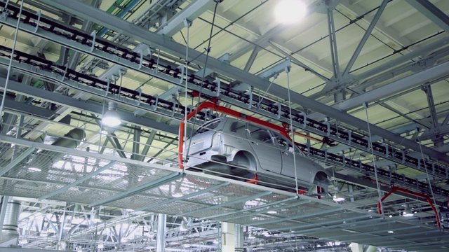 Bodies of car Lada Kalina moves at conveyer of Avtovaz factory