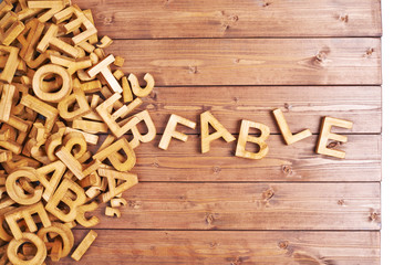 Word fable made with wooden letters