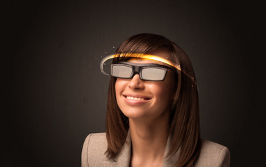 Pretty woman looking with futuristic high tech glasses