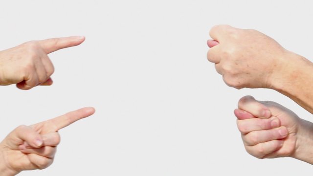 Man senior hands show fig gesture and womans forefinger