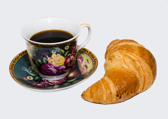 coffee, tea and fresh croissant on a white background