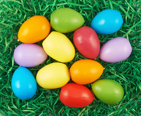 Fototapeta na wymiar Colorful Easter eggs over green ribbons