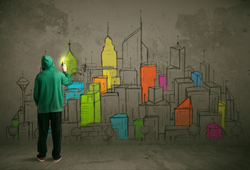 Young urban painter drawing
