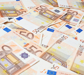 Obraz na płótnie Canvas Multuple fifty euro bank notes