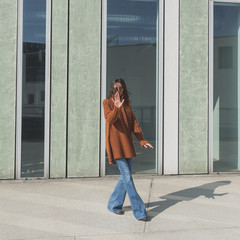 Beautiful girl posing in an urban context
