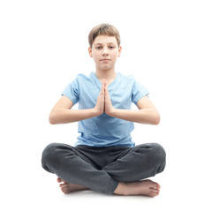 Young boy doing yoga