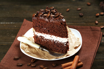 Delicious chocolate cake on table close-up