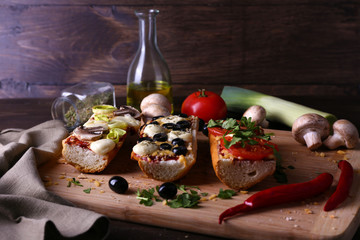 Different sandwiches with vegetables and cheese