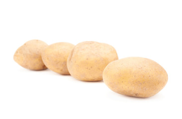 Fototapeta na wymiar Multiple brown potatoes composition