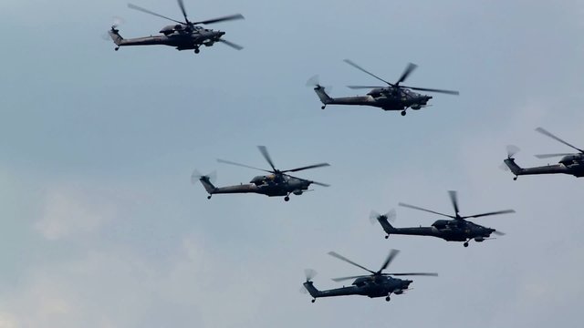 Mi-28N (Berkuts aerobatic team) fly in sky on air show