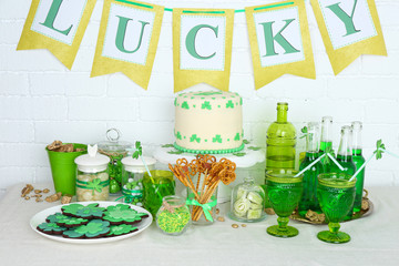 Composition for St Patrick Day with sweets and drinks