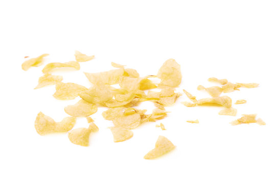 Potato chips crumbs and leftovers isolated