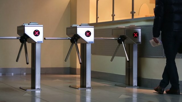 Entrance at building equipped with security turnstile