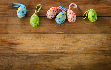 Easter eggs on rustic wooden background