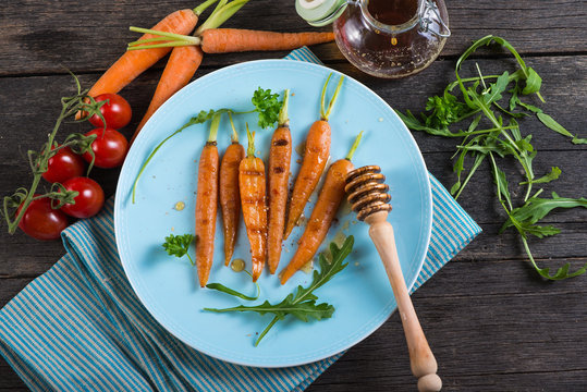 grilled carrots with honey glaze and salad,from above