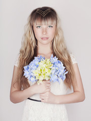 sensual blond woman with flowers